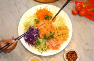 Imlek, Tradisi Yu Sheng Awali Tahun Ular Kayu di Kota Madiun