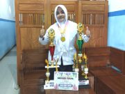 Syifana Siswi MTsN 13 Madiun Raih Juara I Tahfidz Tingkat SMP/MTs di Ajang Prestasi & Seni