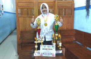 Syifana Siswi MTsN 13 Madiun Raih Juara I Tahfidz Tingkat SMP/MTs di Ajang Prestasi & Seni